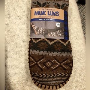 Men’s Muk Luks tall slipper socks, with no slip outersole.Cozy Sherpa lining